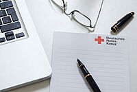 Schreibblock mit DRK Logo und Kugelschreiber 